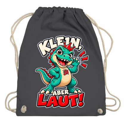 JA Jano Klein aber laut – Turnbeutel in Graphitgrau, Aufdruck: Jano, der JA-Dino: „Klein, aber laut!“ – Kindermotiv mit großer Klappe