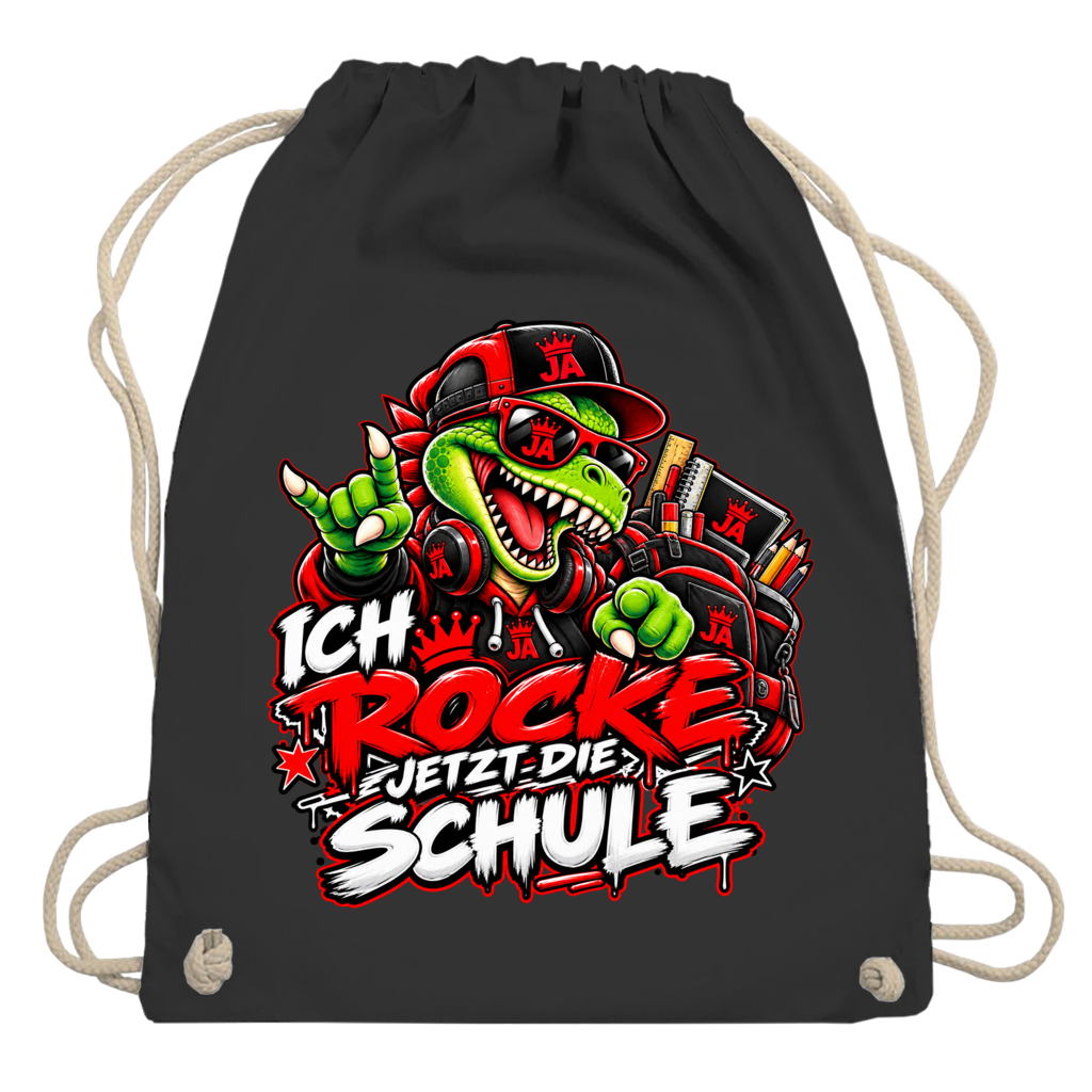 JA Schulstart Dino – Turnbeutel in Schwarz, Aufdruck: Dino mit Cap und Schulsachen: „Ich rocke jetzt die Schule“ zur Einschulung