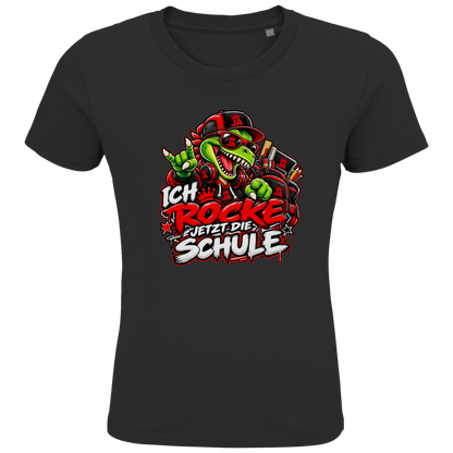JA Schulstart Dino – Kinder-T-Shirt in Schwarz, Vorderansicht, Frontdruck: Dino mit Cap und Schulsachen: „Ich rocke jetzt die Schule“ zur Einschulung