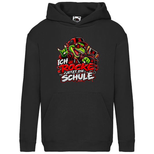 JA Schulstart Dino – Kinder-Hoodie in Schwarz, Vorderansicht, Frontdruck: Dino mit Cap und Schulsachen: „Ich rocke jetzt die Schule“ zur Einschulung