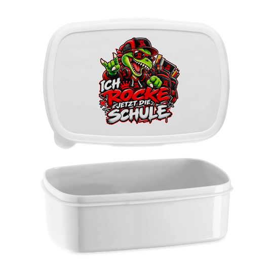 JA Schulstart Dino – Lunchbox in Weiß, Aufdruck: Dino mit Cap und Schulsachen: „Ich rocke jetzt die Schule“ zur Einschulung