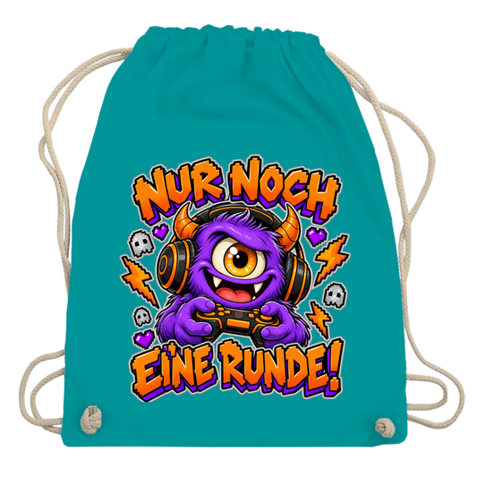 JA Monster Gamer – Turnbeutel in Smaragdgrün, Aufdruck: Gaming-Monster mit Controller: „Nur noch eine Runde!“
