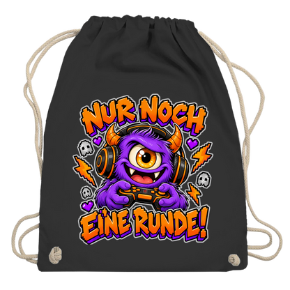 JA Monster Gamer – Turnbeutel in Schwarz, Aufdruck: Gaming-Monster mit Controller: „Nur noch eine Runde!“