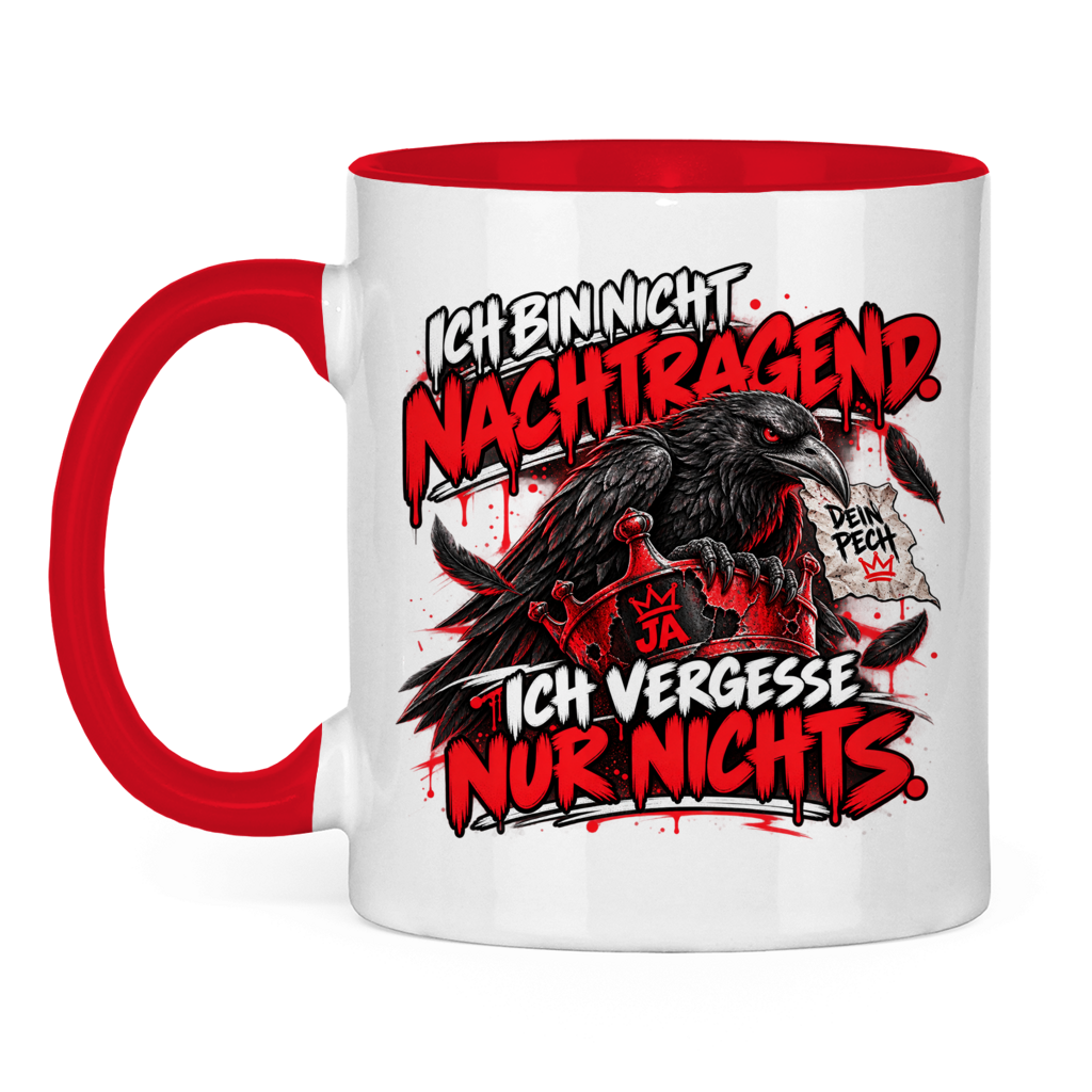 JA Ich vergesse nichts – Tasse in Rot, Vorderansicht, Aufdruck: Rabe auf roter Krone: „Ich bin nicht nachtragend. Ich vergesse nur nichts.“