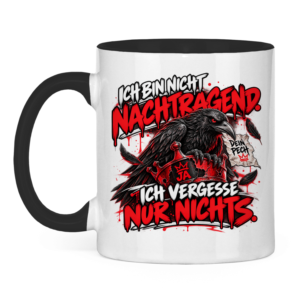 JA Ich vergesse nichts – Tasse in Schwarz, Vorderansicht, Aufdruck: Rabe auf roter Krone: „Ich bin nicht nachtragend. Ich vergesse nur nichts.“