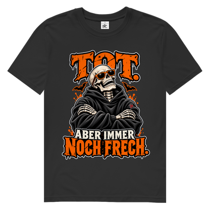 JA Knochenfrech – Herren-Bio-T-Shirt in Schwarz, Vorderansicht, Frontdruck: Skelett mit Sonnenbrille: „Tot. Aber immer noch frech.“ in Orange