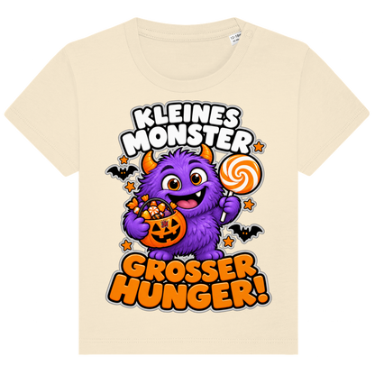 JA Naschmonster – Baby-T-Shirt in Natur, Vorderansicht, Frontdruck: Lila Naschmonster mit Lolli: „Kleines Monster. Großer Hunger!“