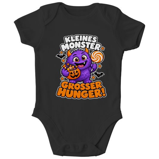 JA Naschmonster – Baby-Body in Schwarz, Vorderansicht, Frontdruck: Lila Naschmonster mit Lolli: „Kleines Monster. Großer Hunger!“