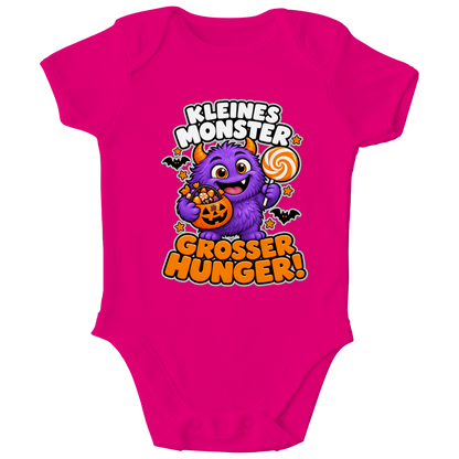 JA Naschmonster – Baby-Body in Fuchsia, Vorderansicht, Frontdruck: Lila Naschmonster mit Lolli: „Kleines Monster. Großer Hunger!“