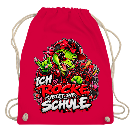 JA Schulstart Dino Mädchen – Turnbeutel in Rot, Aufdruck: Dino-Mädchen mit Schulsachen: „Ich rocke jetzt die Schule“ zur Einschulung