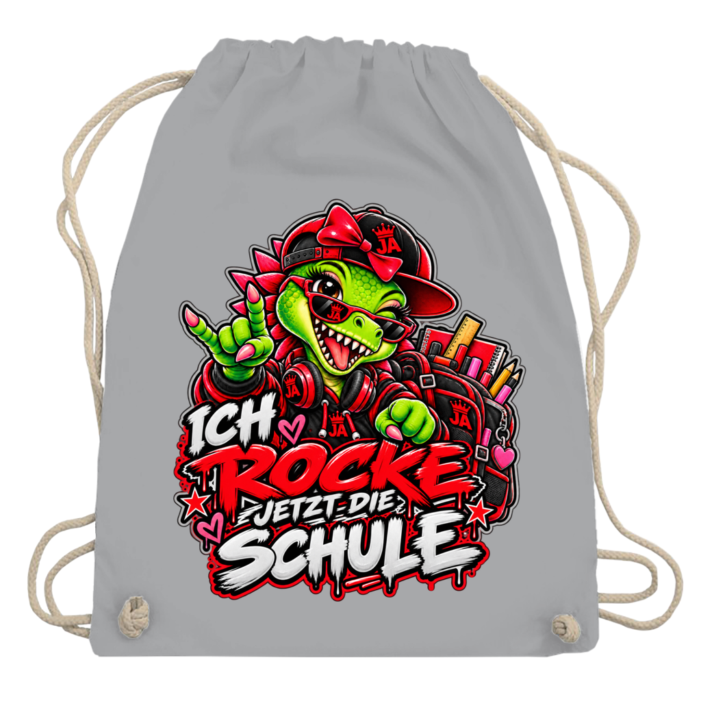 JA Schulstart Dino Mädchen – Turnbeutel in Hellgrau, Aufdruck: Dino-Mädchen mit Schulsachen: „Ich rocke jetzt die Schule“ zur Einschulung