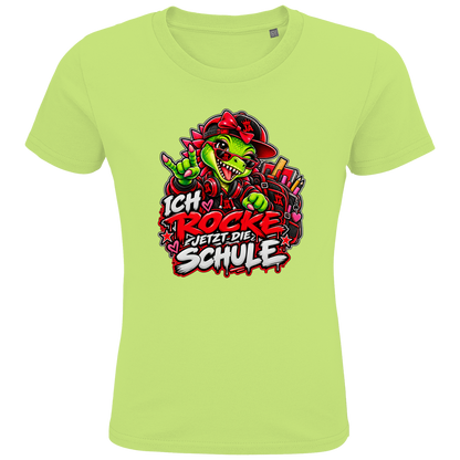 JA Schulstart Dino Mädchen – Kinder-T-Shirt in Apfelgrün, Vorderansicht, Frontdruck: Dino-Mädchen mit Schulsachen: „Ich rocke jetzt die Schule“ zur Einschulung