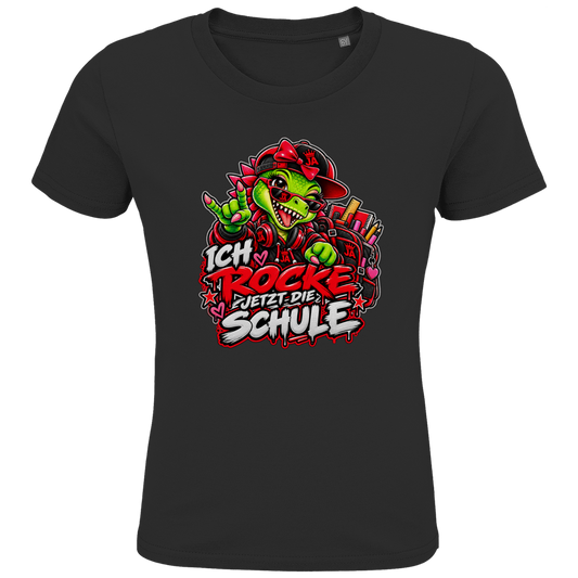 JA Schulstart Dino Mädchen – Kinder-T-Shirt in Schwarz, Vorderansicht, Frontdruck: Dino-Mädchen mit Schulsachen: „Ich rocke jetzt die Schule“ zur Einschulung