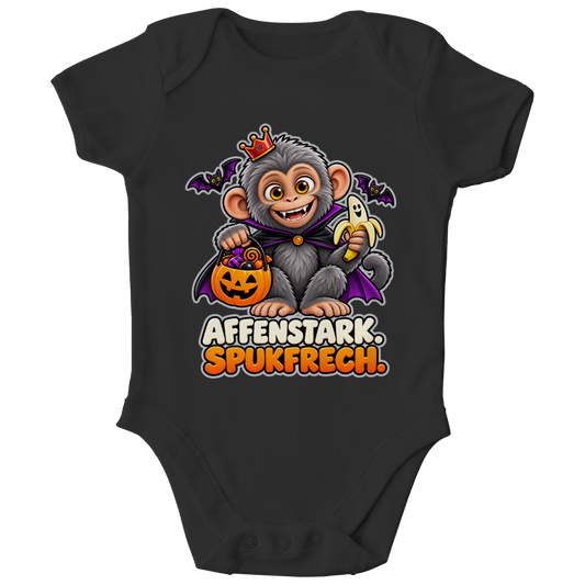 JA Spukaffe – Baby-Body in Schwarz, Vorderansicht, Frontdruck: Kleiner Affe im Vampirumhang: „Affenstark. Spukfrech.“ – Kinder-Halloween