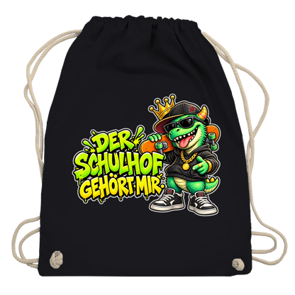 JA Pausenboss – Turnbeutel in Schwarz, Aufdruck: Skater-Dino mit Krone: „Der Schulhof gehört mir“ in Neongrün