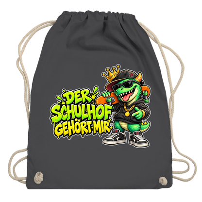 JA Pausenboss – Turnbeutel in Graphitgrau, Aufdruck: Skater-Dino mit Krone: „Der Schulhof gehört mir“ in Neongrün