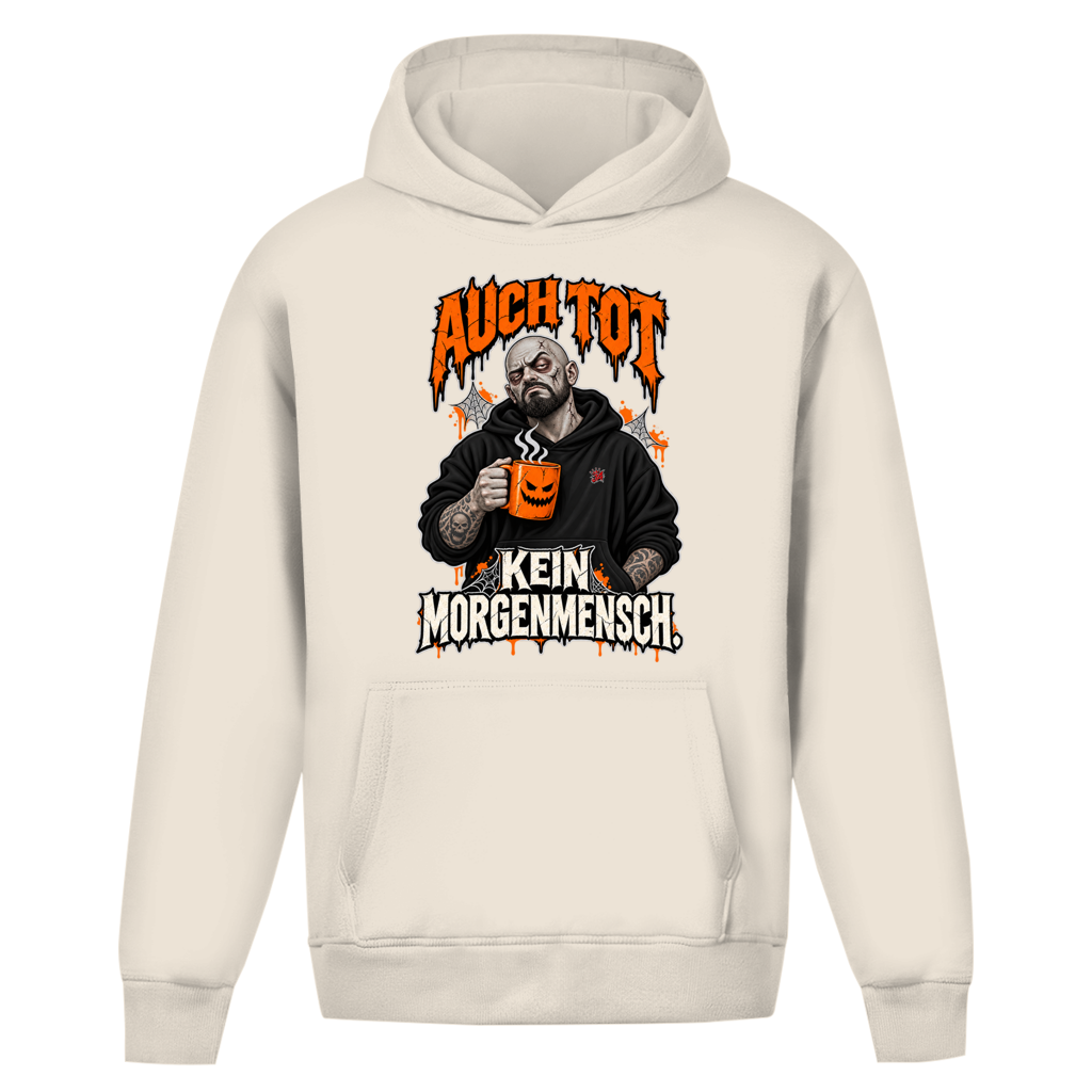 JA Morgenmuffel – Oversize-Hoodie in Sandweiß, Vorderansicht, Frontdruck: Müder Zombie mit Kaffeetasse: „Auch tot. Kein Morgenmensch.“