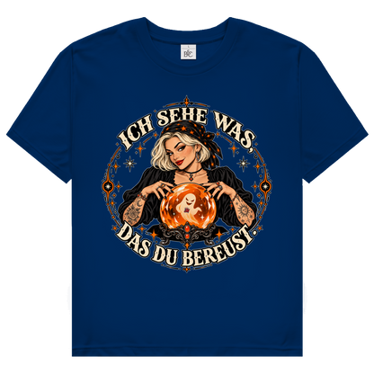 JA Orakel – Damen-T-Shirt in Marineblau, Vorderansicht, Frontdruck: Wahrsagerin mit Kristallkugel und Spruch „Ich sehe was, das du bereust“