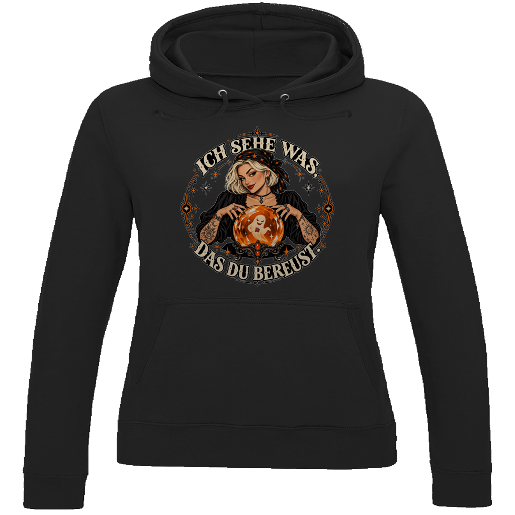 JA Orakel – Damen-Hoodie in Tiefschwarz, Vorderansicht, Frontdruck: Wahrsagerin mit Kristallkugel und Spruch „Ich sehe was, das du bereust“