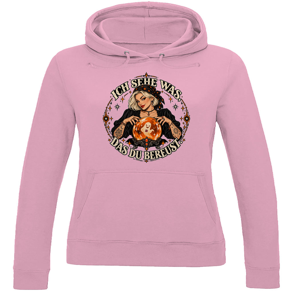 JA Orakel – Damen-Hoodie in Babyrosa, Vorderansicht, Frontdruck: Wahrsagerin mit Kristallkugel und Spruch „Ich sehe was, das du bereust“