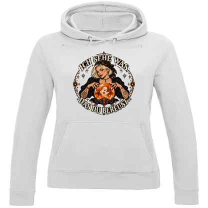 JA Orakel – Damen-Hoodie in Arktisweiß, Vorderansicht, Frontdruck: Wahrsagerin mit Kristallkugel und Spruch „Ich sehe was, das du bereust“