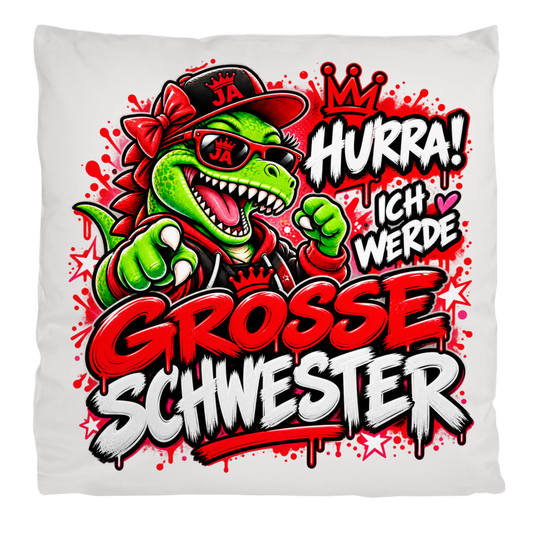 JA Große Schwester Dino – Flauschkissen in Cremeweiß, Aufdruck: Dino-Motiv „Hurra! Ich werde große Schwester“ – Geschenk zur Geschwister-Ankündigung