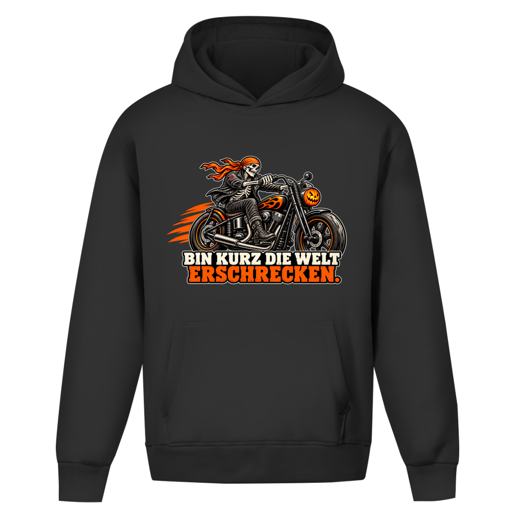 JA Spukbiker – Oversize-Hoodie in Schwarz, Vorderansicht, Frontdruck: Skelett auf dem Motorrad mit Spruch „Bin kurz die Welt erschrecken“